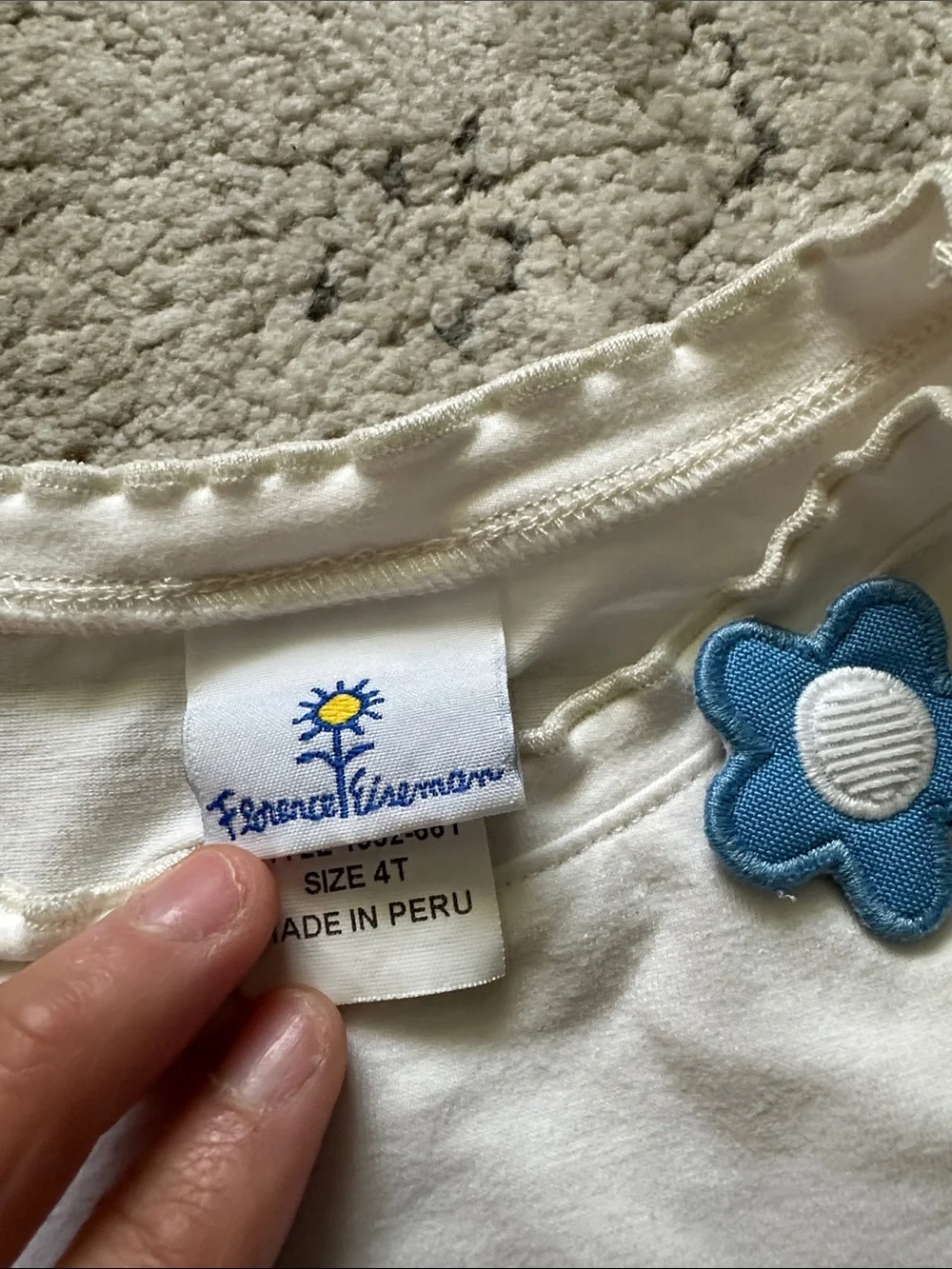 White Long-Sleeve Kids Top with Blue Flower‎ Accent